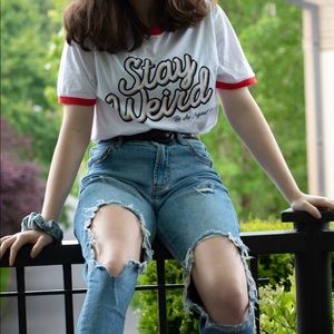 white tee shirt with saying